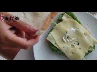 the girl eats a sandwich (sandwich) with sperm
